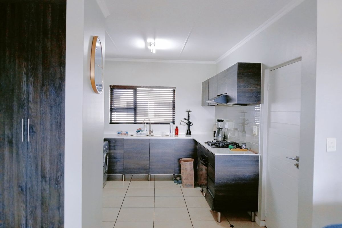 Top-Floor 2-Bed Gem with 2 Balconies & Inverter Backup - Photo 2