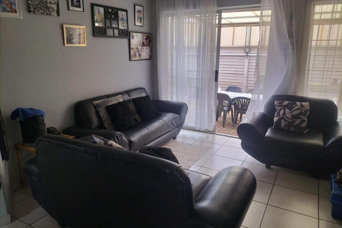 Cozy Starter Home with Pool and Practical Features - Photo 2