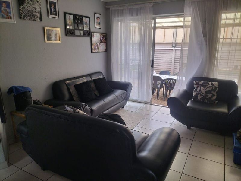 Cozy Starter Home with Pool and Practical Features - Photo 2