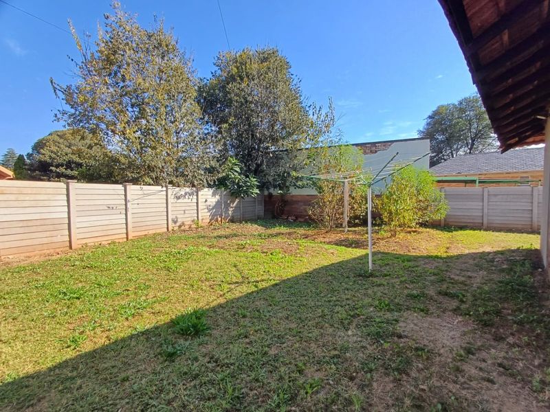 Spacious and Secure Family Home with Dual Access in Stilfontein - Photo 9