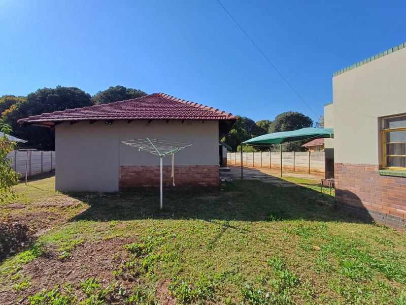 Spacious and Secure Family Home with Dual Access in Stilfontein - Photo 8