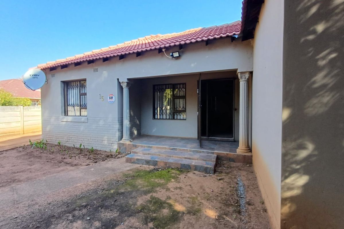 Spacious and Secure Family Home with Dual Access in Stilfontein - Photo 2