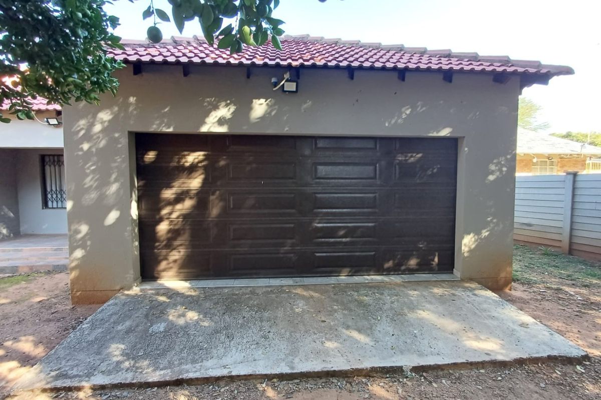 Spacious and Secure Family Home with Dual Access in Stilfontein - Photo 3