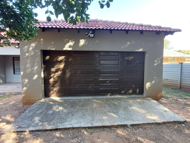 Spacious and Secure Family Home with Dual Access in Stilfontein - Photo 3