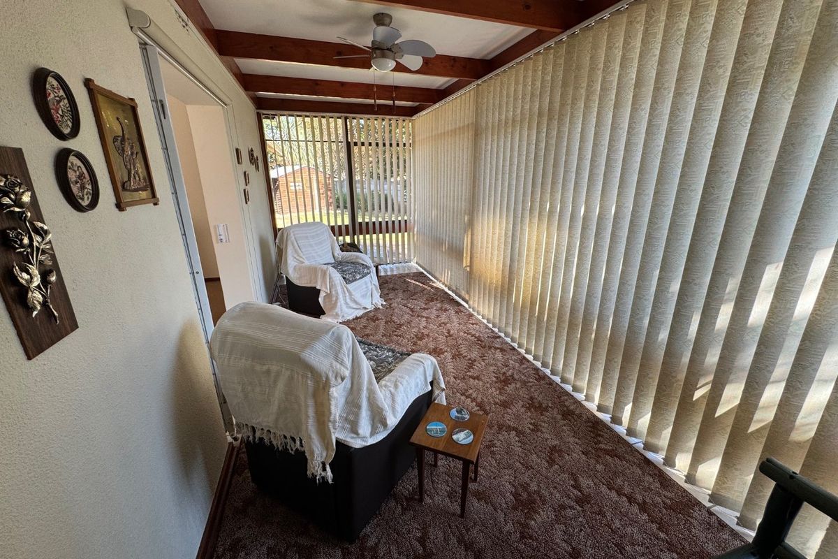 Elegant Four-Bedroom Home with Pool and Ample Storage - Photo 4