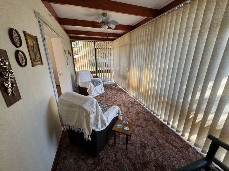 Elegant Four-Bedroom Home with Pool and Ample Storage - Photo 4