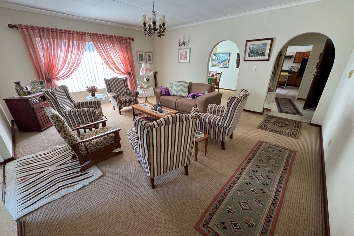 Elegant Four-Bedroom Home with Pool and Ample Storage - Photo 5