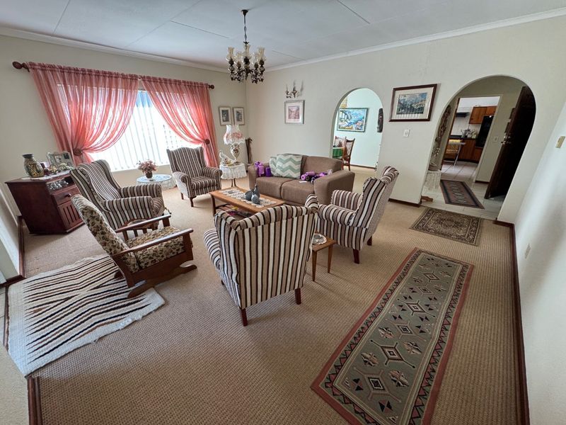 Elegant Four-Bedroom Home with Pool and Ample Storage - Photo 5