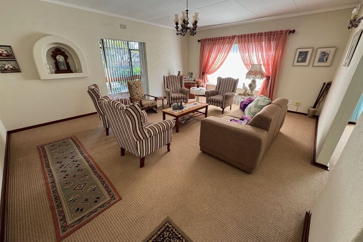 Elegant Four-Bedroom Home with Pool and Ample Storage - Photo 3