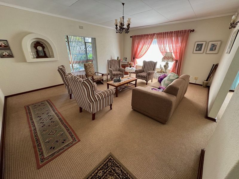 Elegant Four-Bedroom Home with Pool and Ample Storage - Photo 3