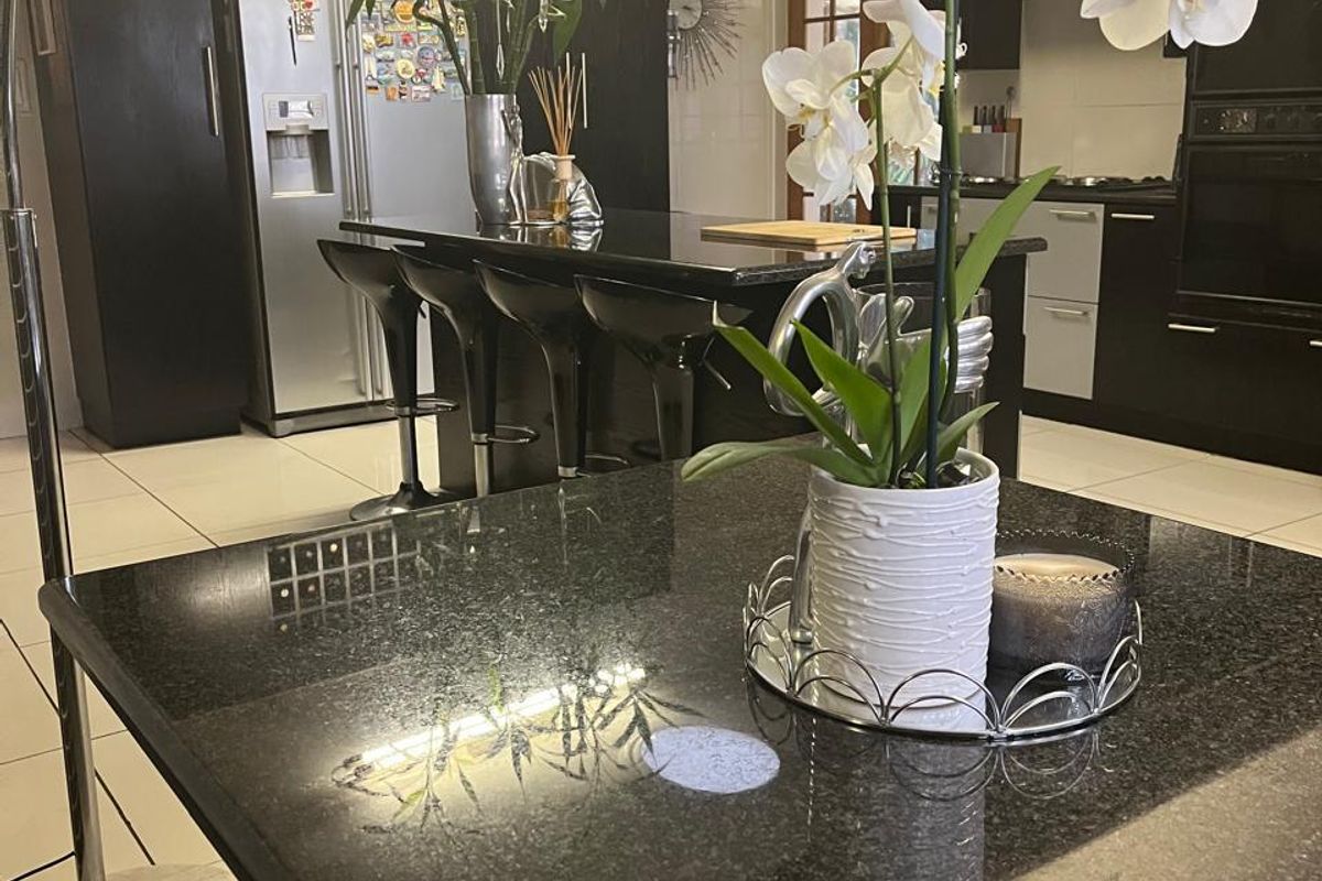 Elegant Double-Story Family Home in Garden Oasis - Photo 5