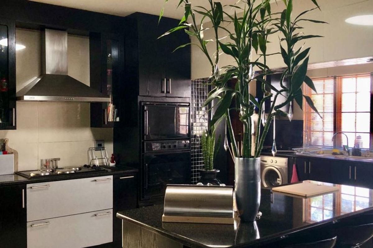 Elegant Double-Story Family Home in Garden Oasis - Photo 4