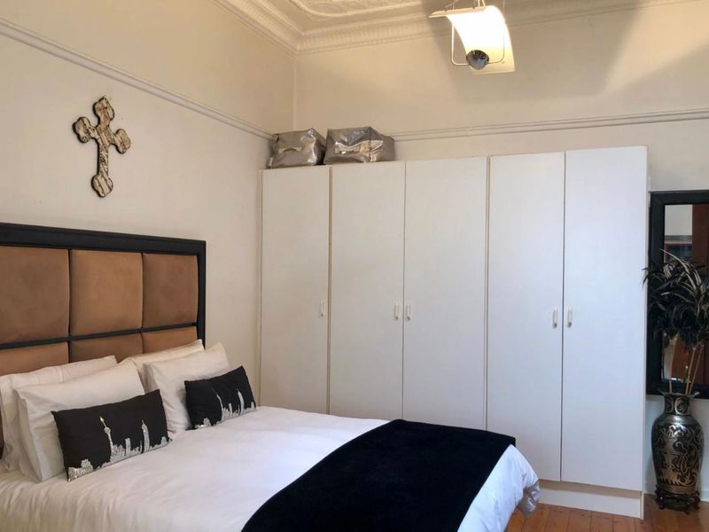 Elegant Double-Story Family Home in Garden Oasis - Photo 9