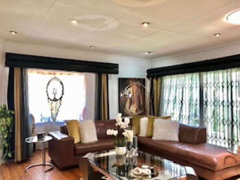 Elegant Double-Story Family Home in Garden Oasis - Photo 8