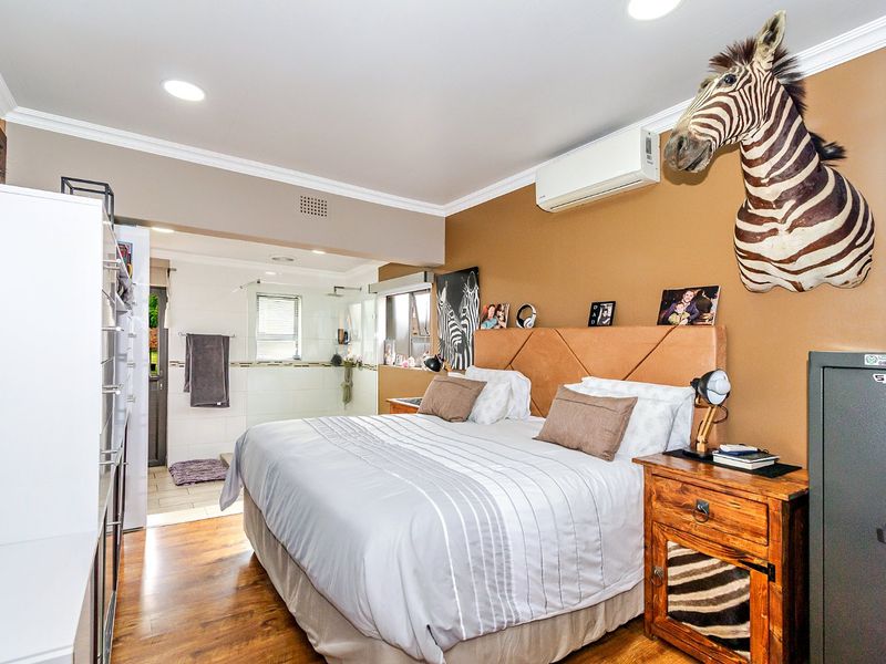 Discover this spacious and secure family home located near top schools - Photo 3