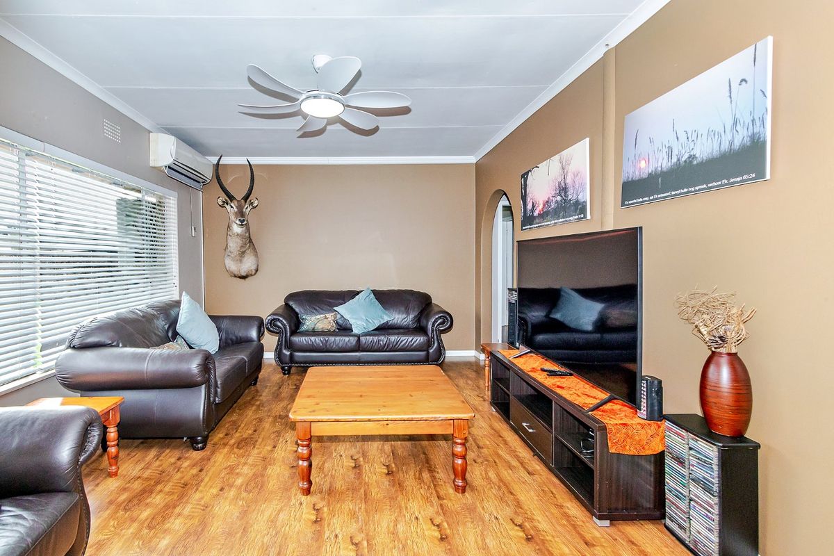 Discover this spacious and secure family home located near top schools - Photo 2