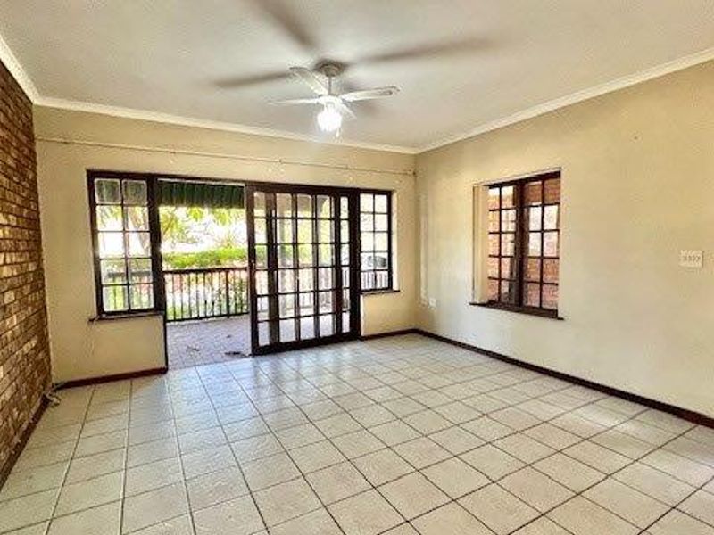 Charming 3-Bedroom Home in Secure Faerie Glen Eco Estate - Photo 5