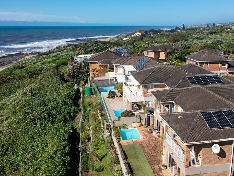 Luxury Living In A Secure Estate On The Beach - Photo 7