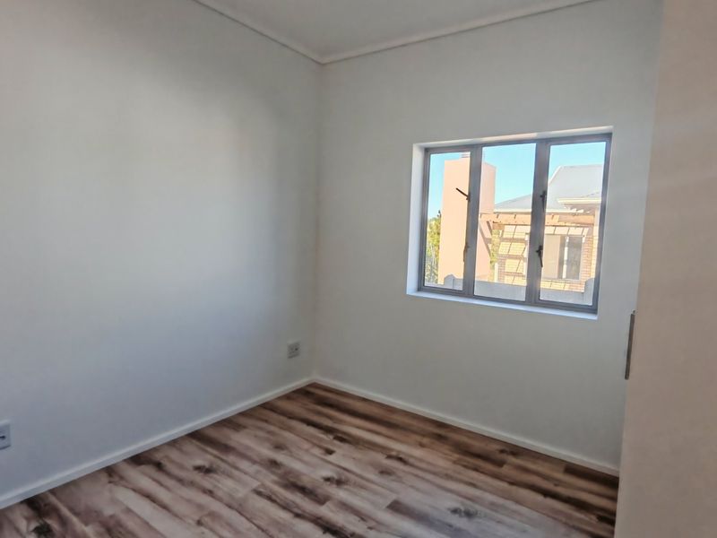 Stylish 3-Bedroom Family Home with Private Deck & Braai Area - Photo 8