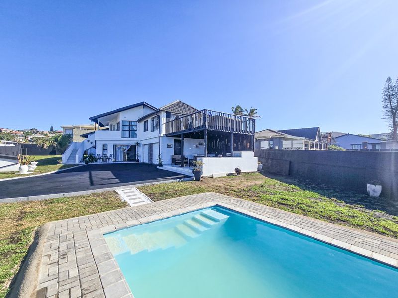 An Absolutely Stunning Home By The Beach - Photo 2