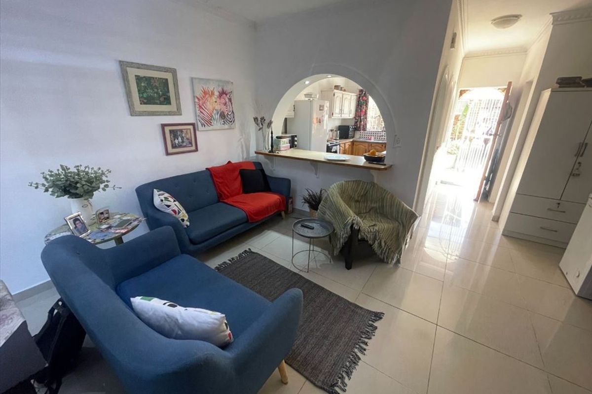 Charming Two-Bedroom Home with Garage and Dining Room - Photo 2