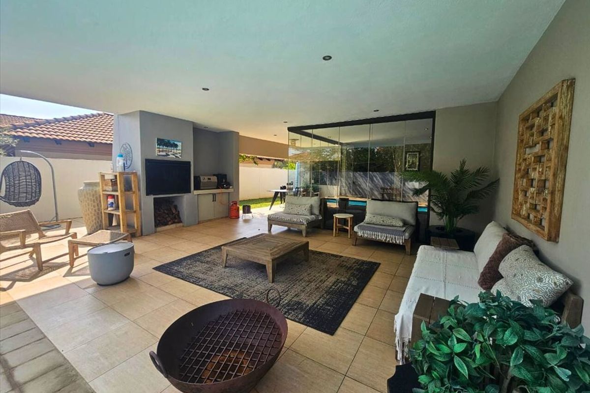 Luxurious Four-Bedroom Home with Pool and Premium Features - Photo 2