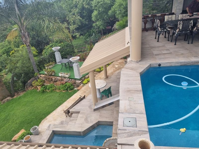 Luxury Hilltop Estate with Panoramic Views – A Masterpiece of Elegance and Opportunity in Hartbeespoort - Photo 10
