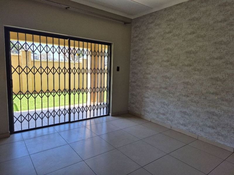 Cozy Two-Bedroom Home with Pool and Outdoor Comfort - Photo 2