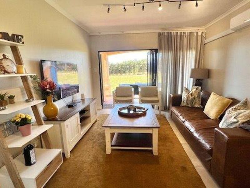 Modern Ground Floor Apartment – Semi-Furnished & Steps from the Beach - Photo 9