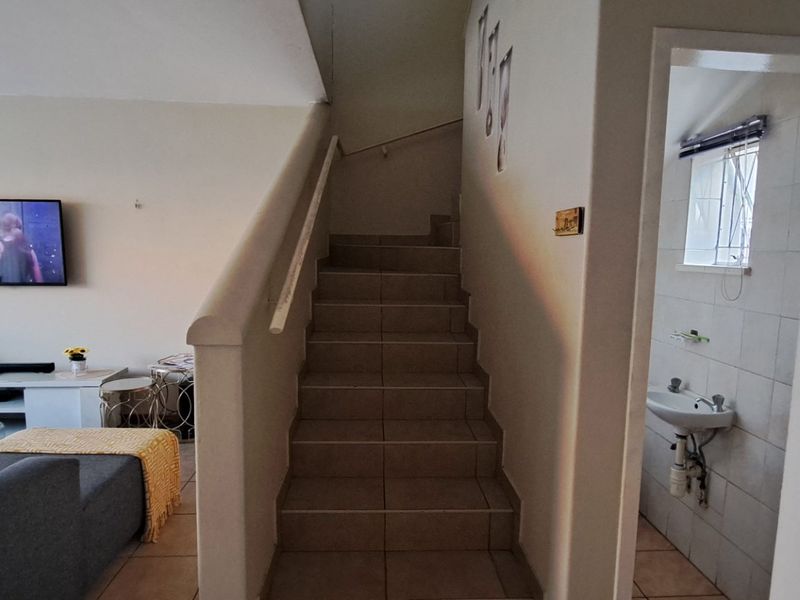 This charming home offers comfortable living in a highly convenient location - Photo 4