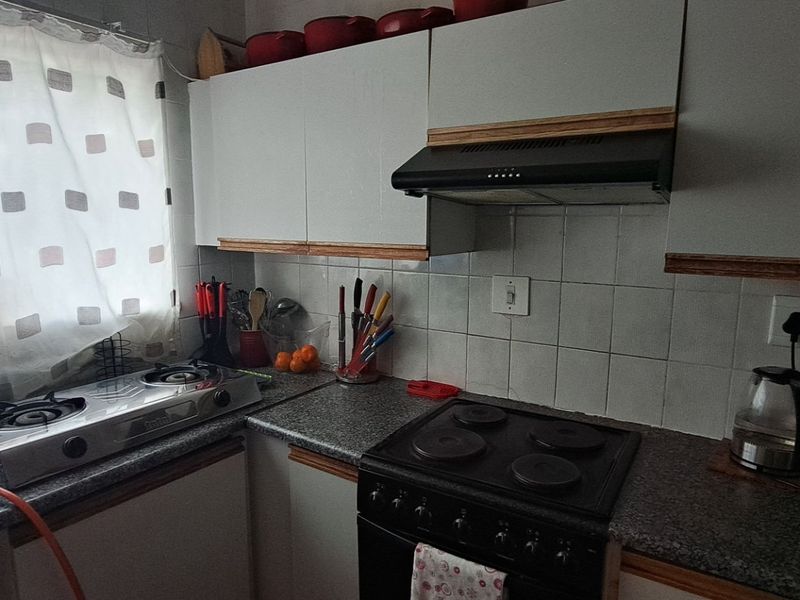 This charming home offers comfortable living in a highly convenient location - Photo 6