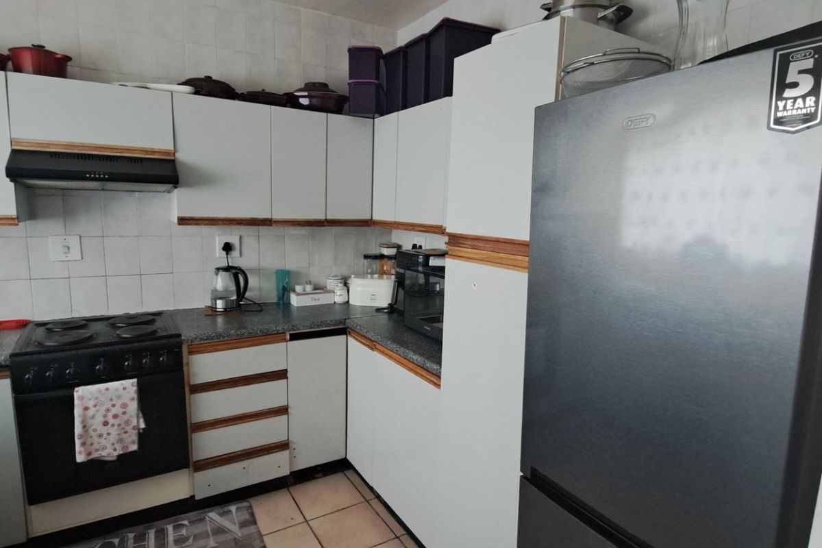 This charming home offers comfortable living in a highly convenient location - Photo 5