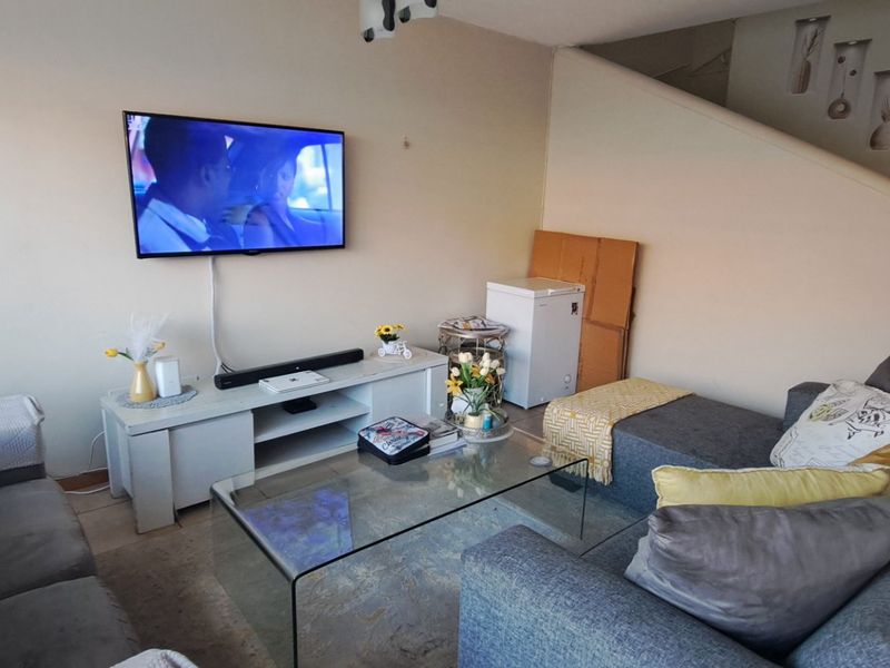 This charming home offers comfortable living in a highly convenient location - Photo 3