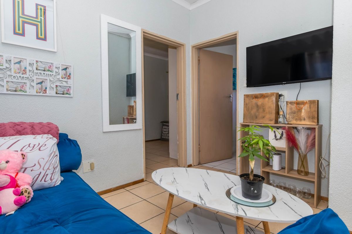 Neat and Spacious Upstairs Unit in a Prime Location - Photo 2