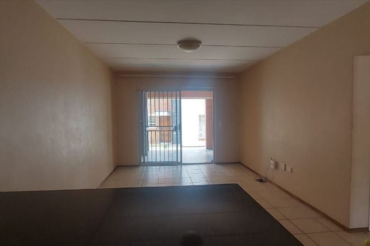 Neat 2-Bedroom Home with En-Suite and Carport - Photo 2