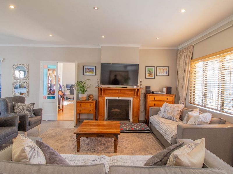 This enchanting 4-bedroom home, nestled in a fully boomed area, offers an inviting blend of space, comfort, and convenience.  - Photo 5