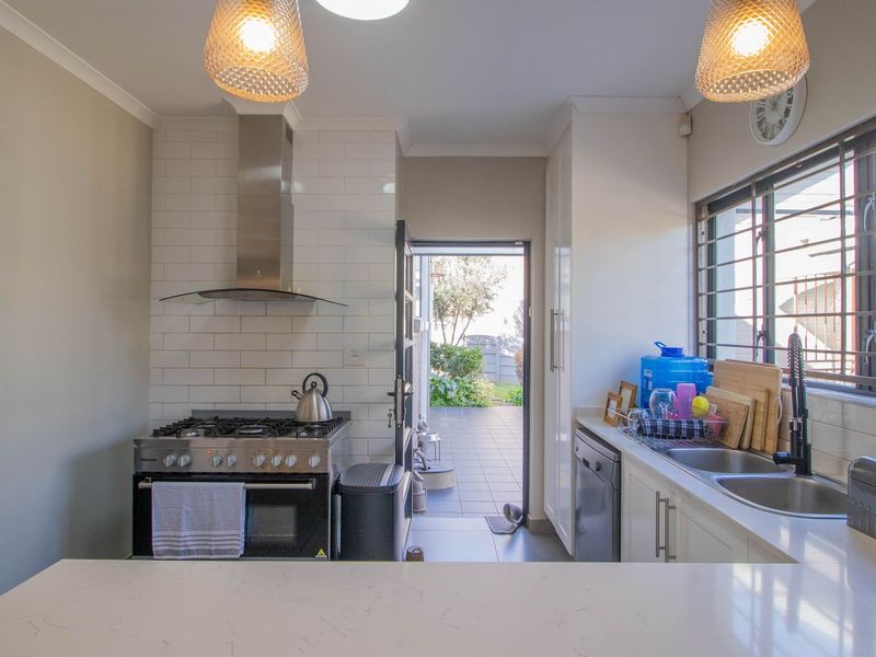 This enchanting 4-bedroom home, nestled in a fully boomed area, offers an inviting blend of space, comfort, and convenience.  - Photo 10