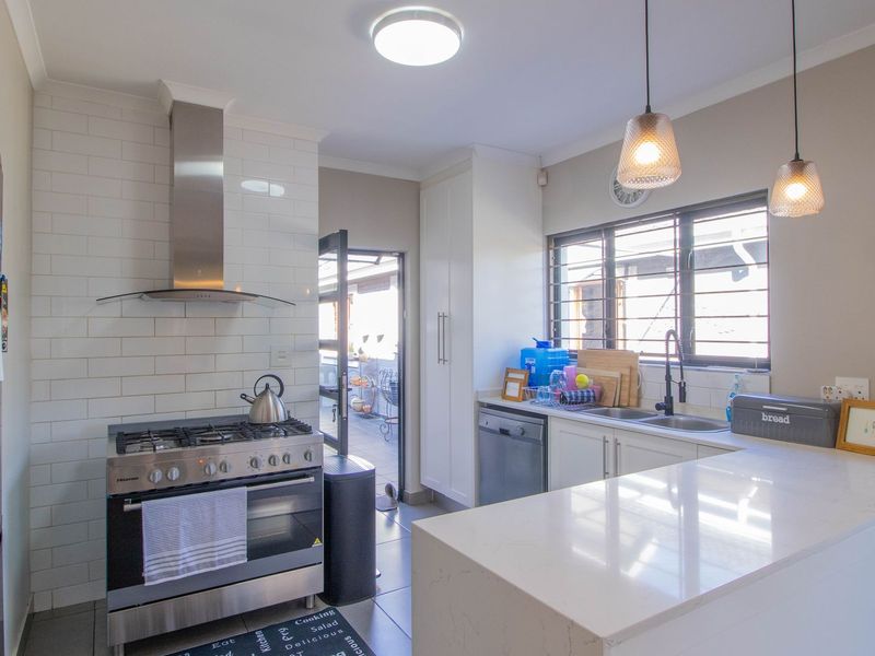 This enchanting 4-bedroom home, nestled in a fully boomed area, offers an inviting blend of space, comfort, and convenience.  - Photo 9