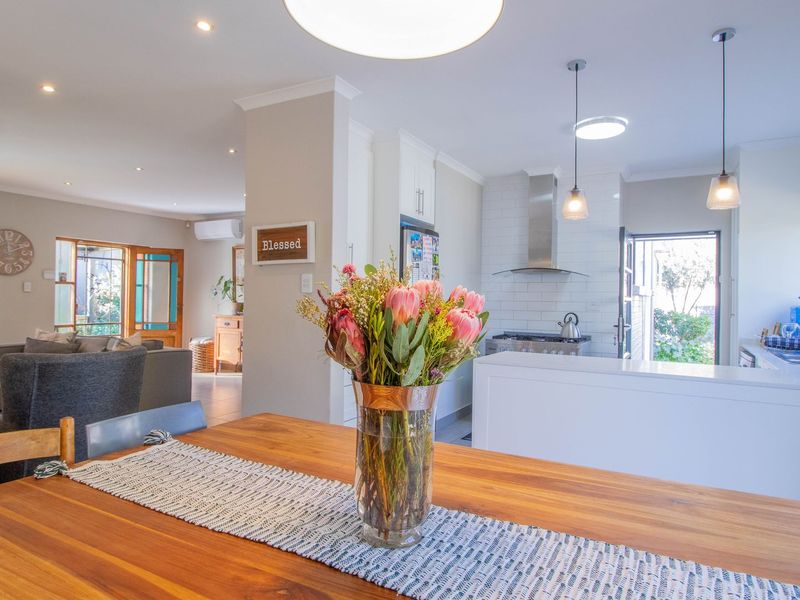 This enchanting 4-bedroom home, nestled in a fully boomed area, offers an inviting blend of space, comfort, and convenience.  - Photo 8