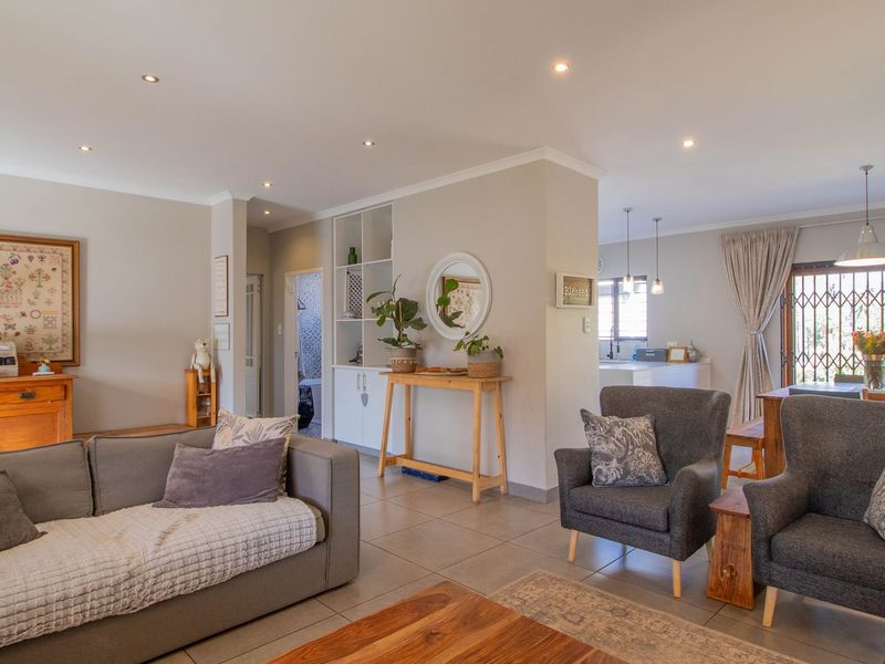 This enchanting 4-bedroom home, nestled in a fully boomed area, offers an inviting blend of space, comfort, and convenience.  - Photo 6