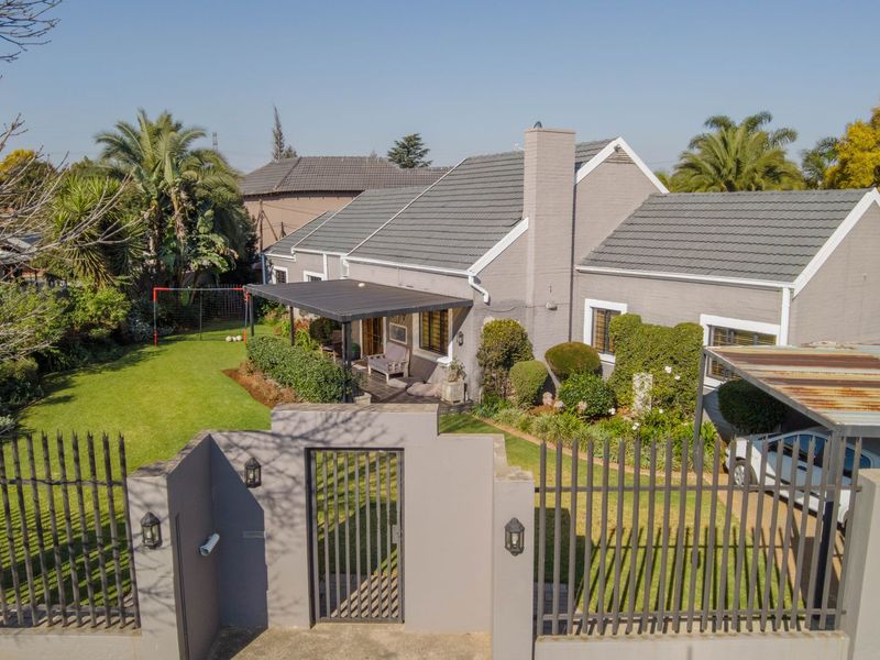This enchanting 4-bedroom home, nestled in a fully boomed area, offers an inviting blend of space, comfort, and convenience.  - Photo 2
