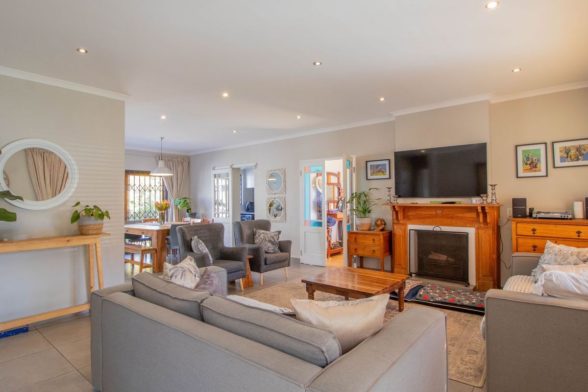 This enchanting 4-bedroom home, nestled in a fully boomed area, offers an inviting blend of space, comfort, and convenience.  - Photo 4