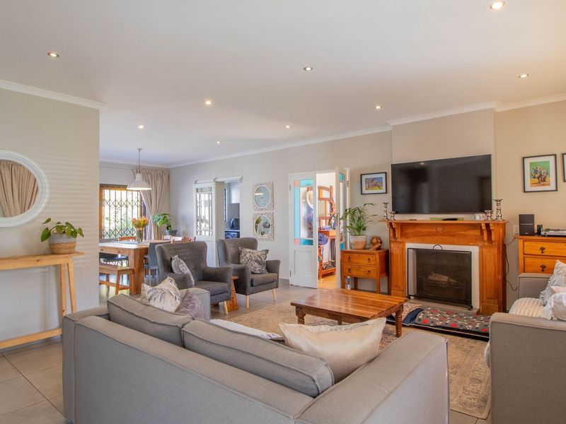 This enchanting 4-bedroom home, nestled in a fully boomed area, offers an inviting blend of space, comfort, and convenience.  - Photo 4