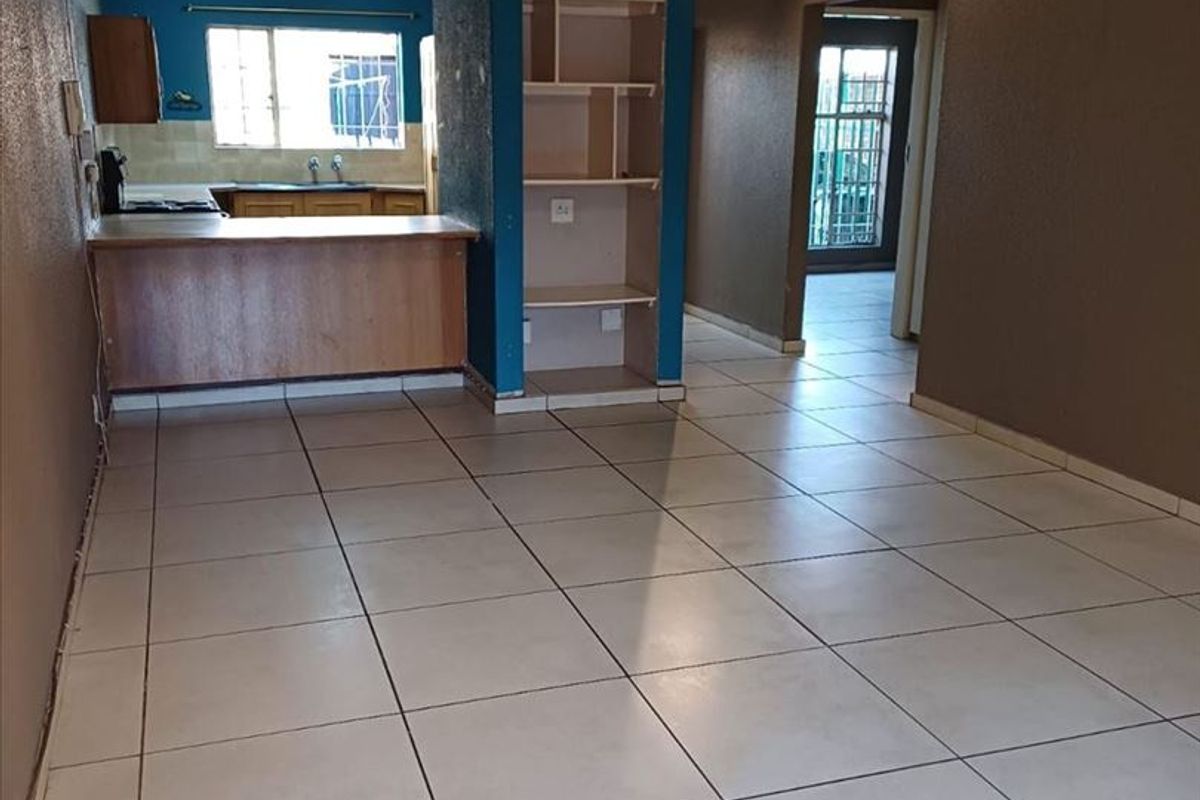 Cozy Two-Bedroom Starter Home with Carport - Photo 2