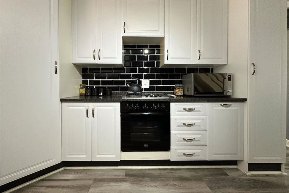 Stylish Three-Bedroom Home with Pool and Study - Photo 2