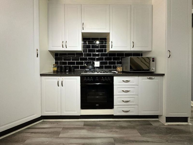 Stylish Three-Bedroom Home with Pool and Study - Photo 2