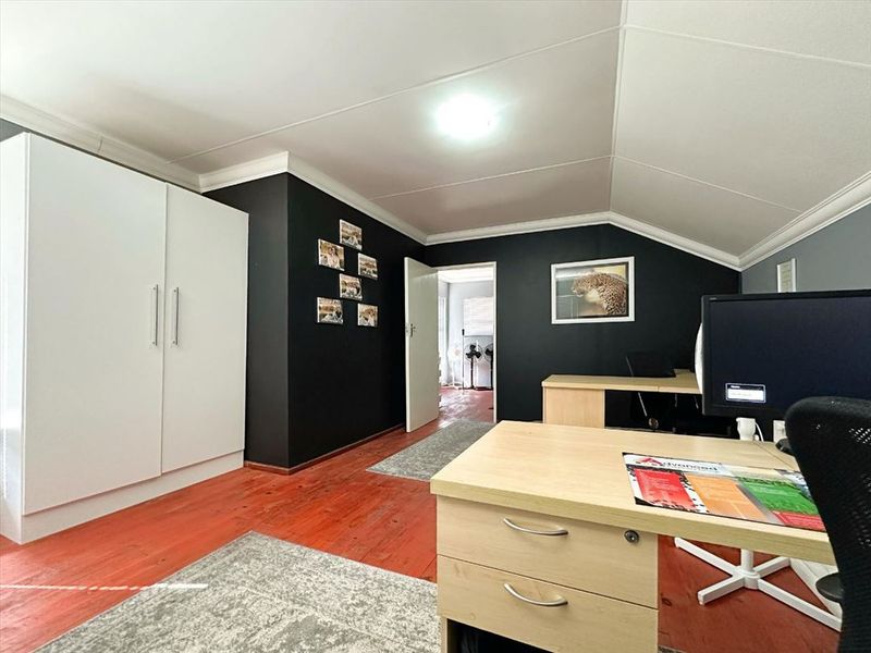 Stylish Three-Bedroom Home with Pool and Study - Photo 9