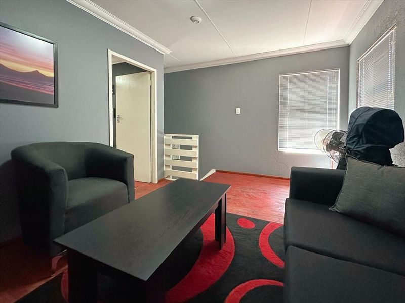 Stylish Three-Bedroom Home with Pool and Study - Photo 6