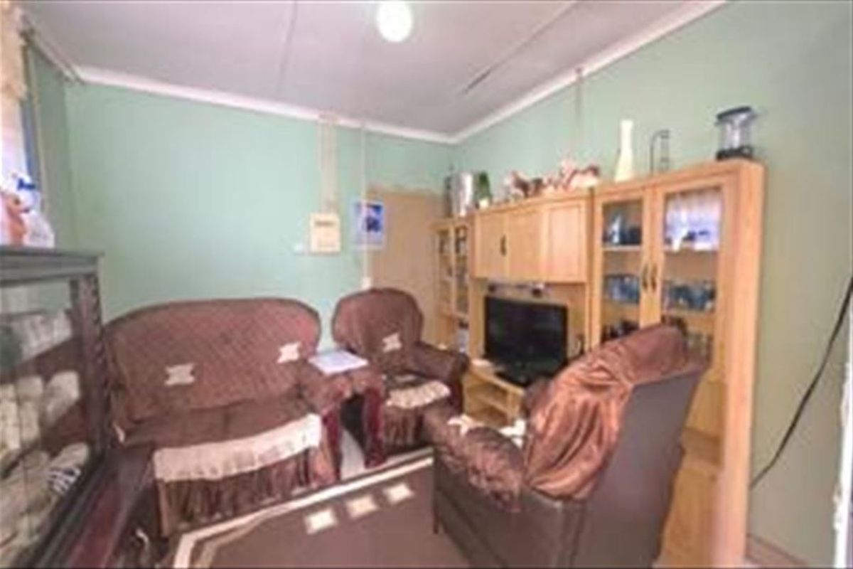 Cozy Two-Bedroom Home with Practical Layout - Photo 2