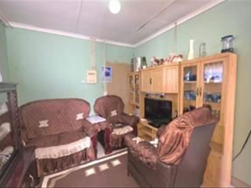 Cozy Two-Bedroom Home with Practical Layout - Photo 2